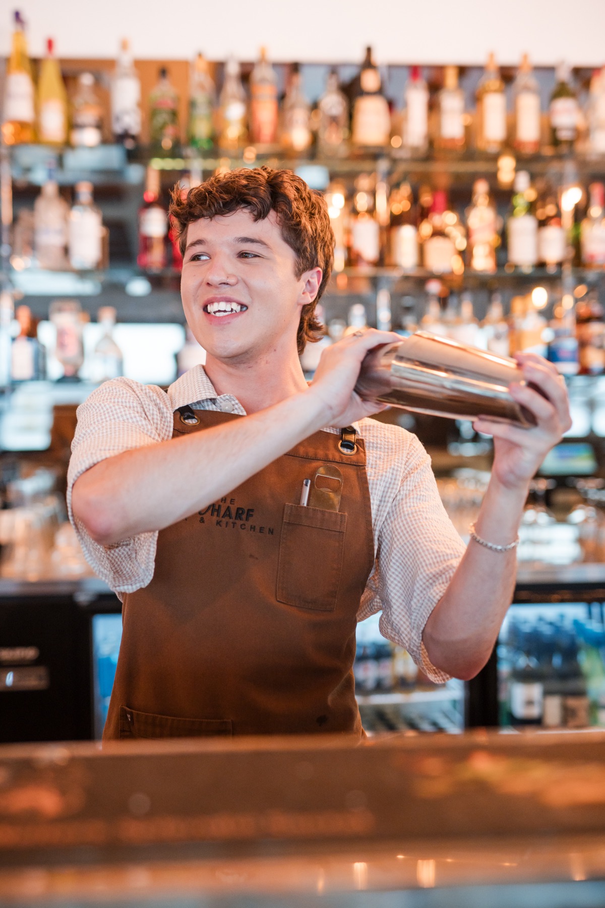Bartender shaking a cocktail
