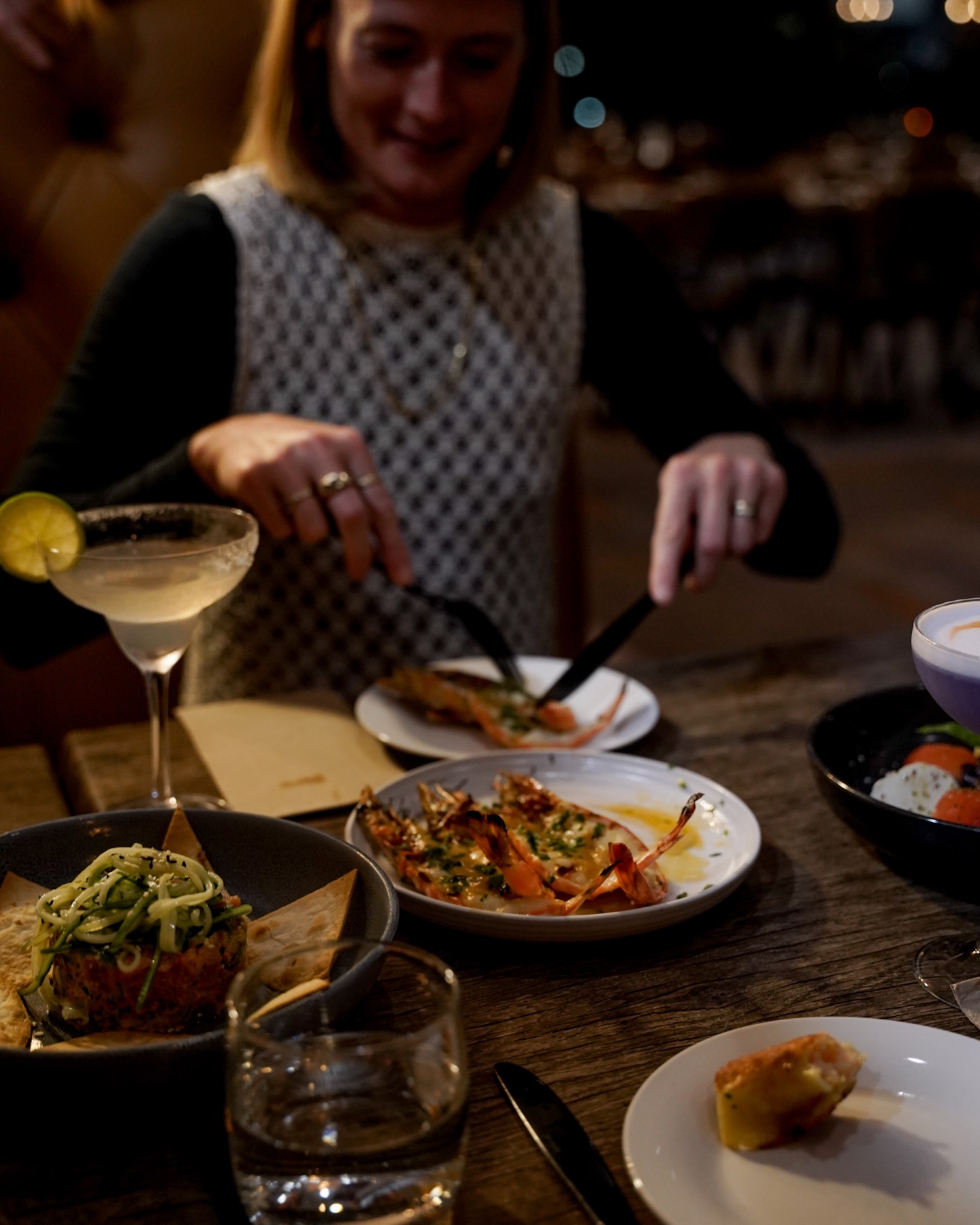 A table spread of shared plates at The Wharf